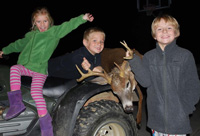 Matt Shumlas's children with prize deer