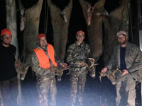 Matt Shumlas and other hunters with their game